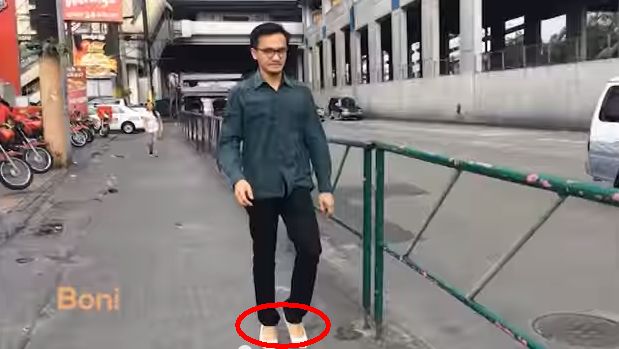 guy walking in heels
