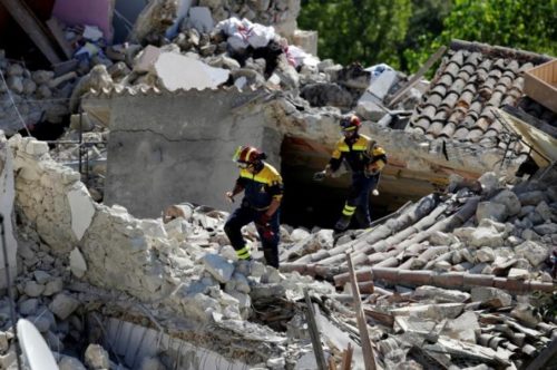 Firefighters inspect damaged houses following an earthquake in Pescara del Tronto, central Italy, August 26, 2016. REUTERS/Max Rossi