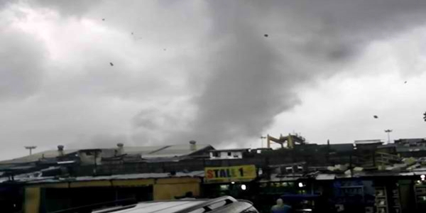 Tornado as it swept through Manila.
