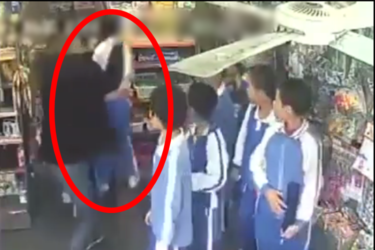 Man Beating An Innocent Boy In Public Caught On Video