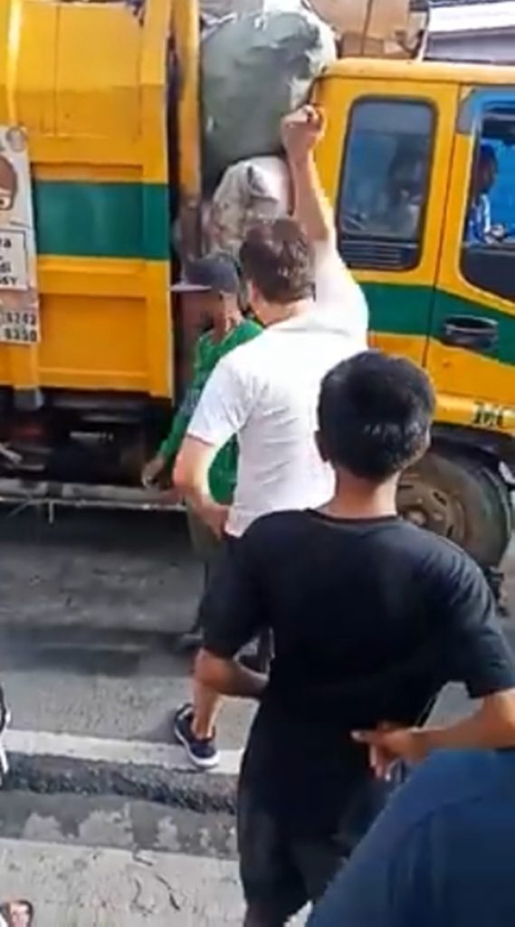 Rude Motorist Shouts, Bullies Garbage Collectors After Their Truck ...