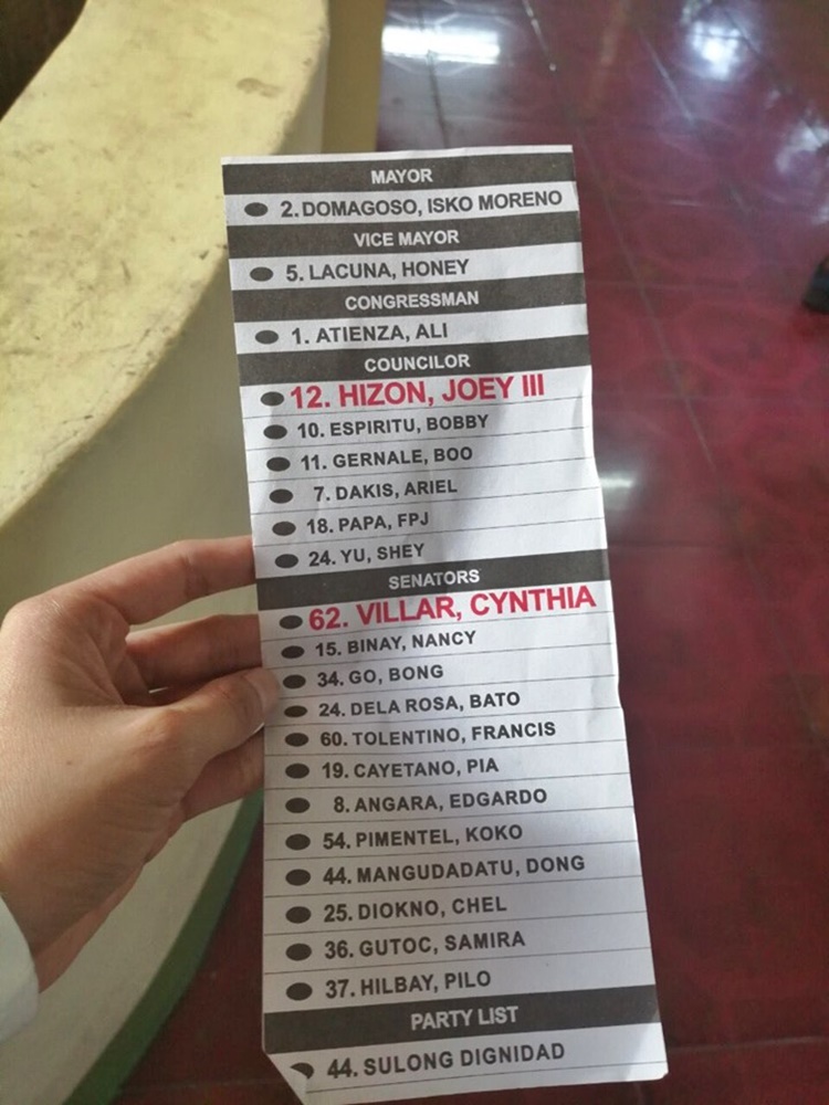 Campaign Materials w/ Politicians' Names Seen Outside 