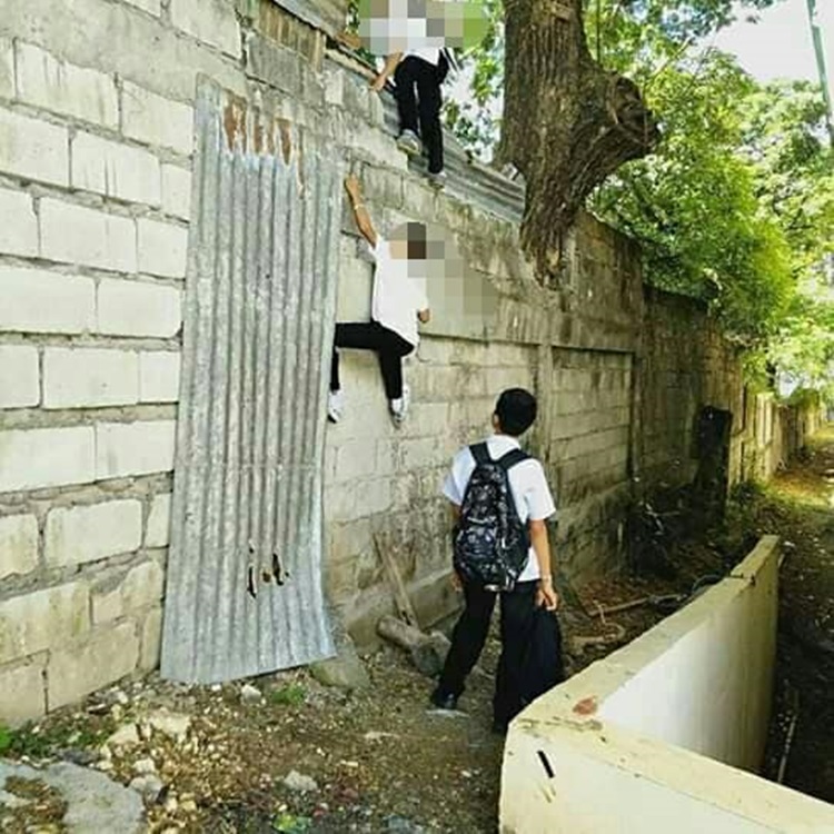 High School Students Caught on Camera Climbing School Wall