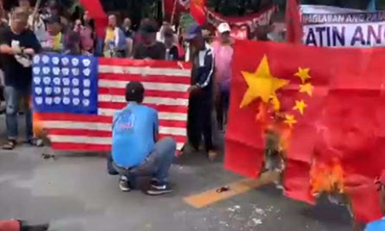 protesters-burn-China-flag