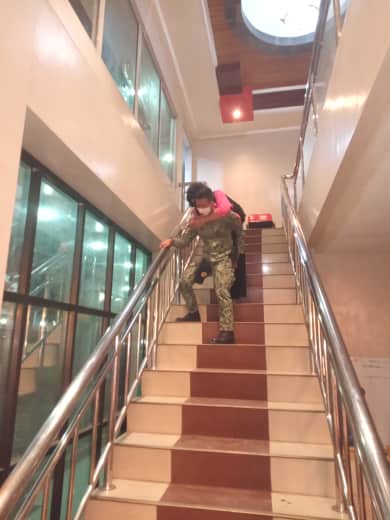 Police Carry PWD Woman