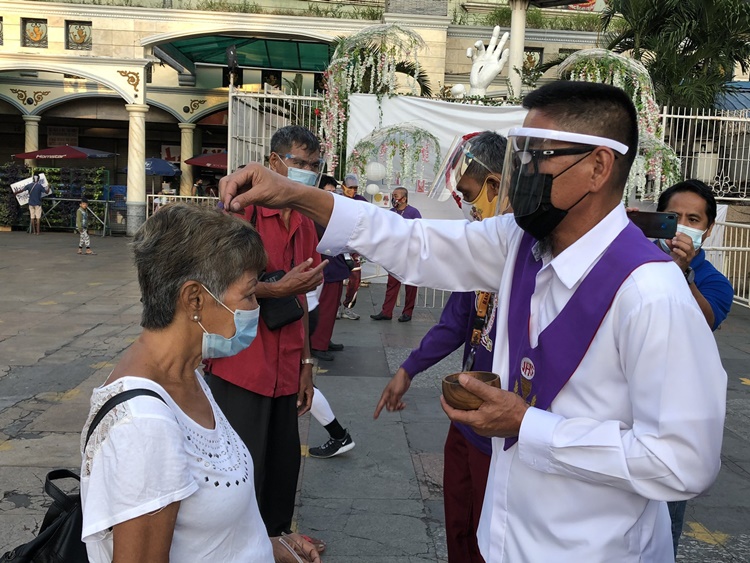 Filipino Devotees Follow Health Protocols During Observance Of Ash Wednesday 