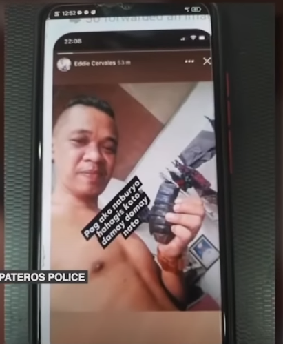 Man Holding Grenade