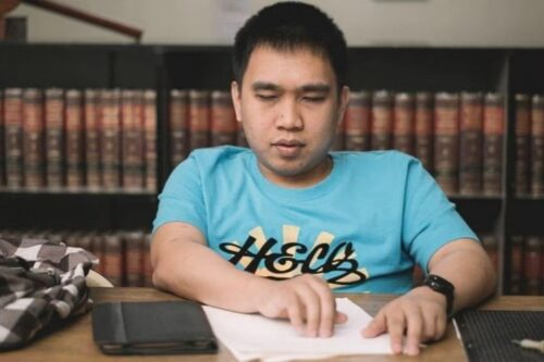 Blind UB Law Graduate
