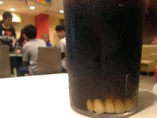 Drink with False Teeth