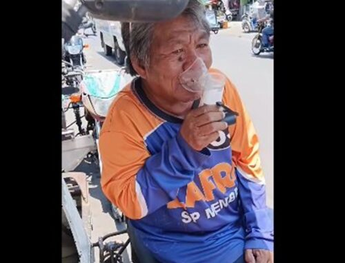 Elderly Tricycle Driver