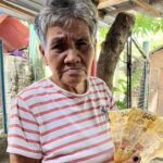 Elderly Fish Vendor