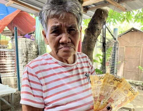 Elderly Fish Vendor